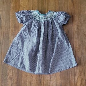 Rosalina Collection Boutique  Black and White Smocked Dress with Elegant Design